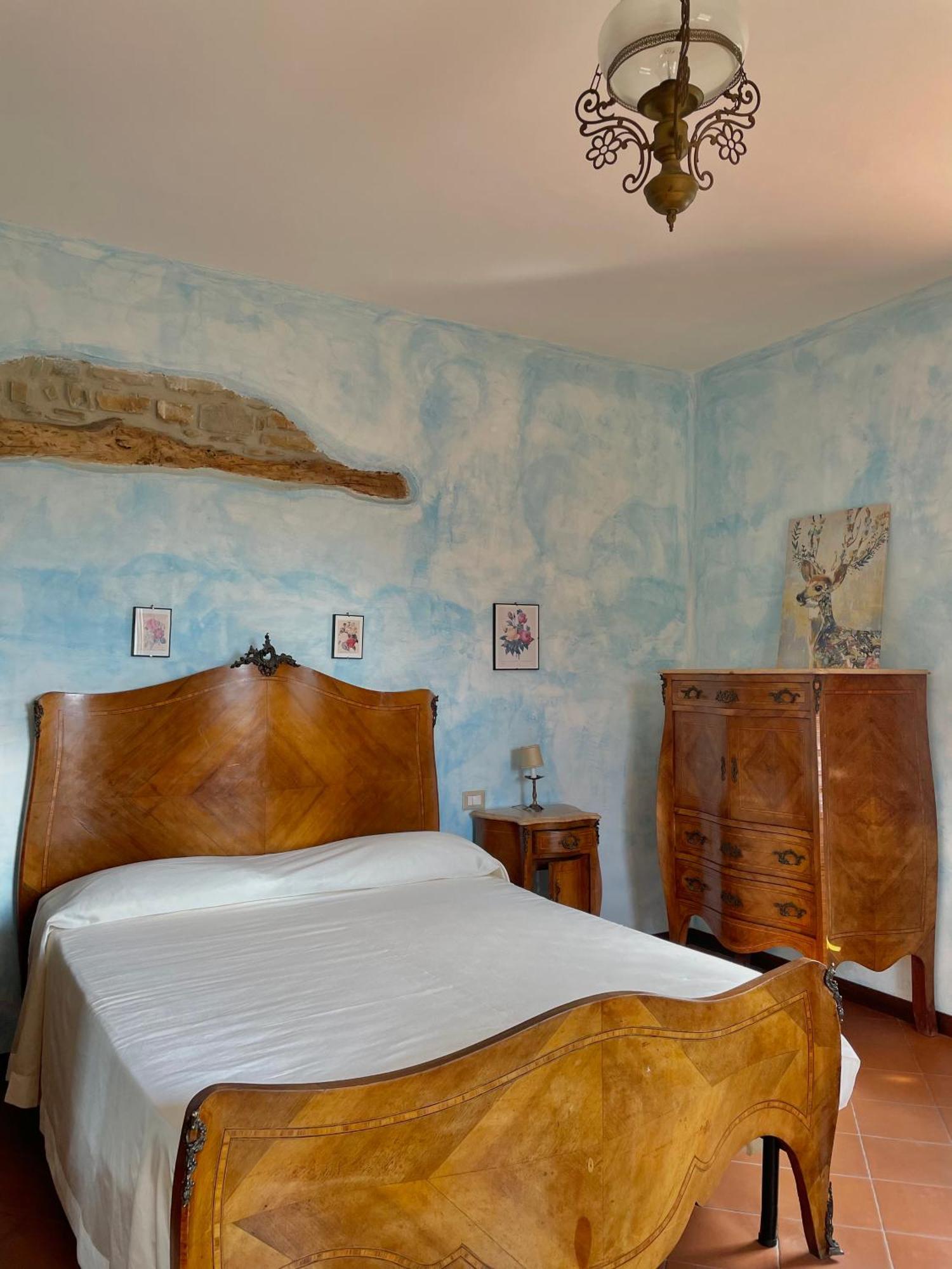 Agriturismo Piano Di Andrea Ostigliano Exteriör bild