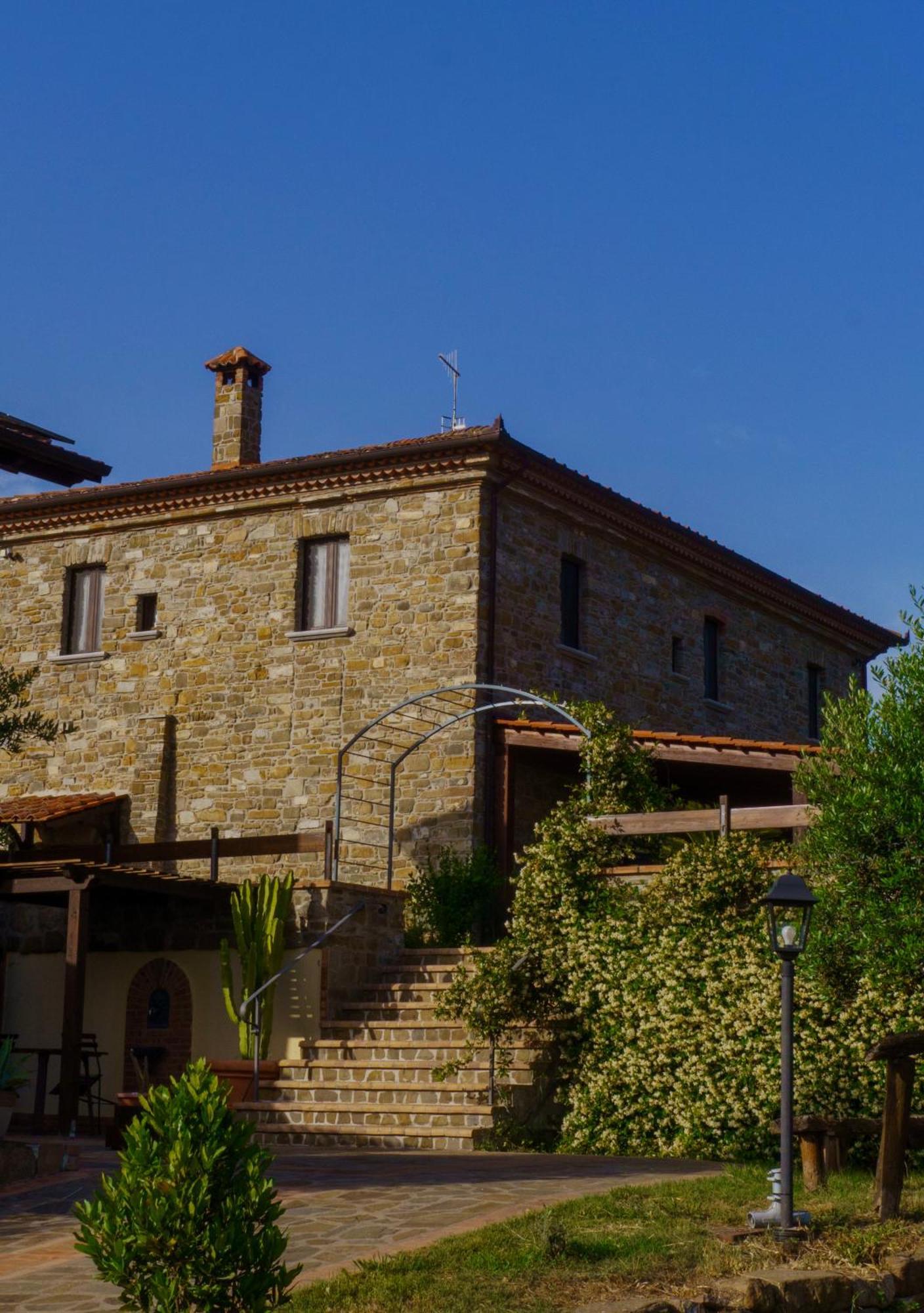 Agriturismo Piano Di Andrea Ostigliano Exteriör bild